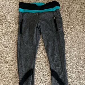 Lululemon Size 6 Gray Leggings with Mesh Cutouts and Teal at Waist